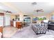 Spacious living room with views of the pool and canal at 2096 Massachusetts Ne Ave, St Petersburg, FL 33703
