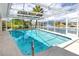 Enjoy waterfront views from the screened-in pool, offering a perfect blend of relaxation and recreation at 2096 Massachusetts Ne Ave, St Petersburg, FL 33703