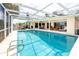 Inviting pool area with screened enclosure and plenty of room for entertaining and relaxing at 2096 Massachusetts Ne Ave, St Petersburg, FL 33703