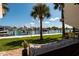 Backyard view of a boat dock and canal at 222 Skiff Pt, Clearwater, FL 33767