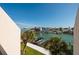 Waterfront balcony view with boats, docks and blue water at 222 Skiff Pt, Clearwater, FL 33767