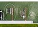 Overhead view of boat lifts on the canal near the condo and lush green lawn at 222 Skiff Pt, Clearwater, FL 33767