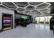 Garage features custom lighting, epoxy floor, and garage door to the rear at 222 Skiff Pt, Clearwater, FL 33767