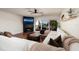 Bright and airy living room with modern furniture, fireplace, and sliding glass doors to the balcony at 222 Skiff Pt, Clearwater, FL 33767