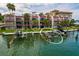 Waterfront condos with boat lifts and stunning view of the water and neighboring buildings at 222 Skiff Pt, Clearwater, FL 33767