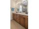 Bathroom featuring a double vanity sink with lots of counter space at 2490 Kensington Greens Dr # 0, Sun City Center, FL 33573