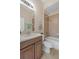 Traditional bathroom featuring tile floors and a shower-tub combo at 2490 Kensington Greens Dr # 0, Sun City Center, FL 33573