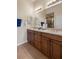 Spacious bathroom featuring a double vanity sink with lots of storage and counter space at 2490 Kensington Greens Dr # 0, Sun City Center, FL 33573