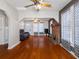 Spacious living room with a brick fireplace and hardwood floors at 302 W Curtis St, Tampa, FL 33603