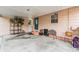 Carport with concrete flooring and light pink painted siding at 3035 Hillview St, Sarasota, FL 34239