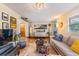 Comfortable living room with a neutral palette, hardwood floors, and natural light at 3035 Hillview St, Sarasota, FL 34239