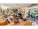 Inviting living room featuring hardwood floors and ample natural light at 3035 Hillview St, Sarasota, FL 34239