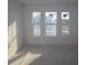 Bedroom featuring carpet and windows at 316 Vistera Blvd, Nokomis, FL 34275
