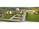 Luxury home boasting professionally landscaped grounds, manicured green spaces, and elegant curb appeal at 316 Vistera Blvd, Nokomis, FL 34275