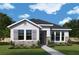 Charming single-story home with stone accents, gray shutters, and well-manicured landscaping at 316 Vistera Blvd, Nokomis, FL 34275