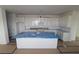 Spacious kitchen featuring an island, ample cabinet space, and modern design elements at 316 Vistera Blvd, Nokomis, FL 34275