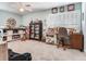Spacious room offers ample natural light from windows and is complete with neutral toned walls at 3724 Fawn Grove Ct, Land O Lakes, FL 34639