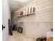 Walk-in closet with multiple shelves and ample storage space for personal items at 3724 Fawn Grove Ct, Land O Lakes, FL 34639