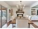 Tasteful dining room with refined decor and an open connection to outdoors at 3724 Fawn Grove Ct, Land O Lakes, FL 34639