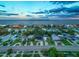 An aerial view showcasing the property among a residential neighborhood near a waterfront at 3947 Overlook Ne Dr, St Petersburg, FL 33703