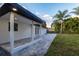 Charming outdoor patio area showcasing modern design and offering an inviting space for relaxation and entertainment at 3947 Overlook Ne Dr, St Petersburg, FL 33703