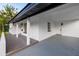 Exterior of home features covered parking and dark wood accent at 3947 Overlook Ne Dr, St Petersburg, FL 33703