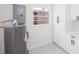 Features of room include utility closet and white cabinets at 3947 Overlook Ne Dr, St Petersburg, FL 33703