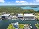 Aerial shot of waterfront homes with boat docks near large covered boat storage buildings at 4137 Des Prez Ct, Hernando Beach, FL 34607