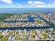 Wide aerial view of waterfront homes on canals in a coastal community near Gulf of Mexico at 4137 Des Prez Ct, Hernando Beach, FL 34607