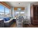 Cozy breakfast nook with bench seating, water views, and a stylish chandelier at 4137 Des Prez Ct, Hernando Beach, FL 34607
