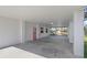 Spacious carport with ample parking, featuring a convenient storage area and views of the waterfront at 4137 Des Prez Ct, Hernando Beach, FL 34607