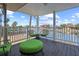 Waterfront deck featuring comfortable seating and scenic views of the channel at 4137 Des Prez Ct, Hernando Beach, FL 34607