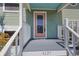 Charming front door with vibrant colors at 4137 Des Prez Ct, Hernando Beach, FL 34607