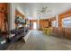 Spacious garage with wood paneled walls, storage, and room for recreational equipment at 4137 Des Prez Ct, Hernando Beach, FL 34607