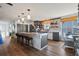 Spacious kitchen features a large island, granite countertops, and stainless steel appliances at 4137 Des Prez Ct, Hernando Beach, FL 34607