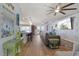 Open-concept living room featuring modern decor and ample natural light at 4137 Des Prez Ct, Hernando Beach, FL 34607