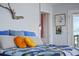 Comfortable bedroom featuring a turtle print bedspread and bright pillows at 4137 Des Prez Ct, Hernando Beach, FL 34607