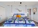 Bright main bedroom featuring a turtle print bedspread and natural light at 4137 Des Prez Ct, Hernando Beach, FL 34607
