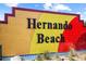 Welcoming Hernando Beach entrance sign, a colorful beacon for this waterfront community at 4137 Des Prez Ct, Hernando Beach, FL 34607