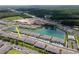 Aerial view of townhome with picturesque waterfront scenery and easy access to amenities at 4262 Cloud Hopper Way, Lutz, FL 33559