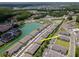 Well-maintained townhome community with scenic lake views and convenient parking at 4262 Cloud Hopper Way, Lutz, FL 33559
