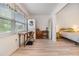 Bedroom area with natural light and combined laundry at 4748 Azalea Dr # 204, New Port Richey, FL 34652