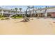 Outdoor courtyard area offering seating and well-manicured landscaping, perfect for socializing at 4748 Azalea Dr # 204, New Port Richey, FL 34652