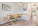 Cozy dining area with seating for two, featuring bright lighting and modern floors, ideal for intimate meals at 4748 Azalea Dr # 204, New Port Richey, FL 34652