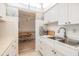 This efficient kitchen flows into the dining area, creating a functional layout perfect for everyday living and entertaining at 4748 Azalea Dr # 204, New Port Richey, FL 34652