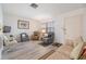 Bright living room featuring light floors and a comfortable layout, perfect for relaxation and entertaining at 4748 Azalea Dr # 204, New Port Richey, FL 34652