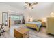 Spacious main bedroom with flooring, natural light, and ceiling fan at 4748 Azalea Dr # 204, New Port Richey, FL 34652