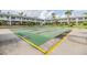 Enjoy shuffleboard on well-maintained courts surrounded by beautiful landscaping at 4748 Azalea Dr # 204, New Port Richey, FL 34652