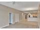 Open concept living room showcasing tile floors, open kitchen, and bright, airy feel at 530 S Gulfview Blvd # 203, Clearwater Beach, FL 33767