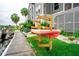 Kayaks and paddleboards in a rack along the walkway near the boat dock for the condo at 5712 Biscayne Ct # 201, New Port Richey, FL 34652